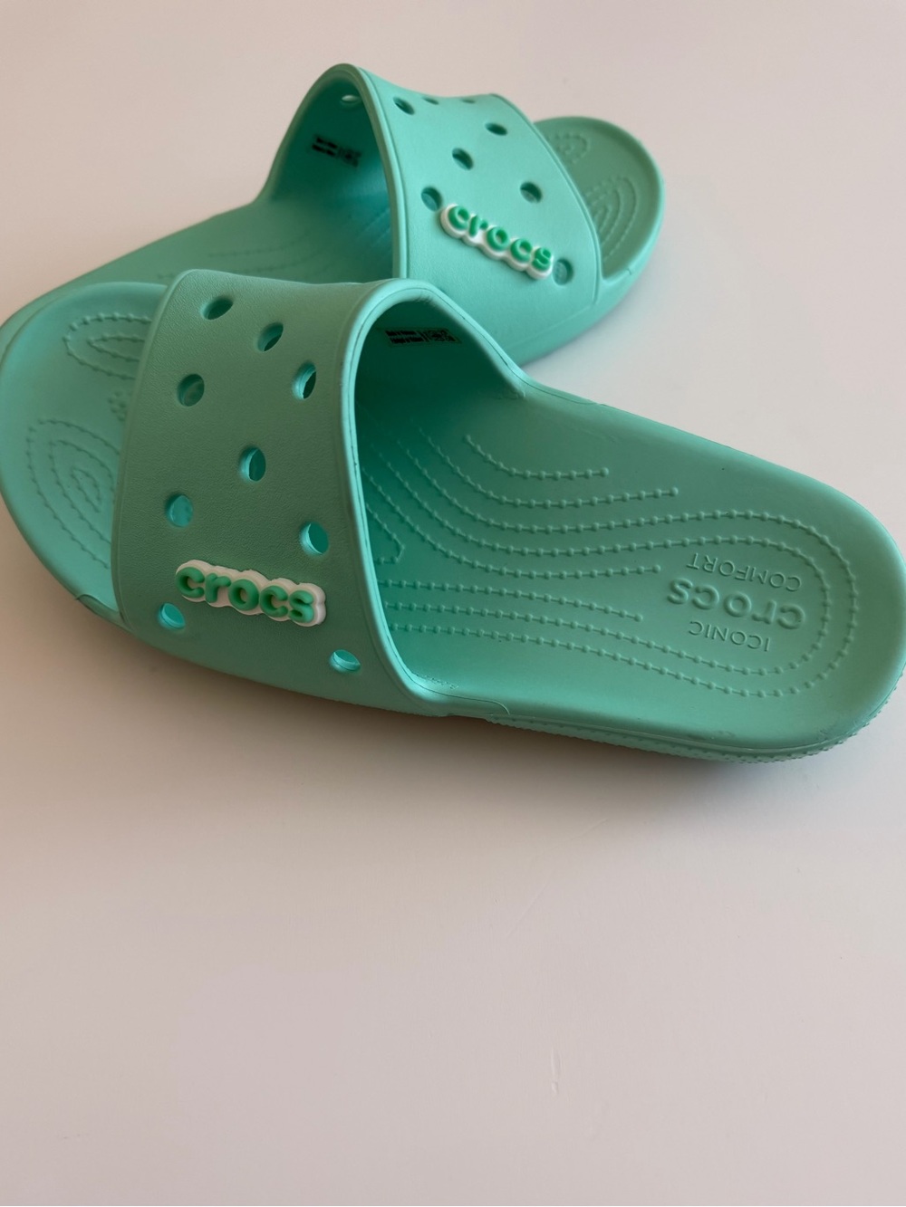CROCS Slides Like New Womens 9/Mens 7 Seafoam color with CROC Charm